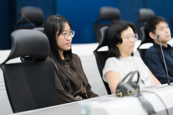 Participants following the talk