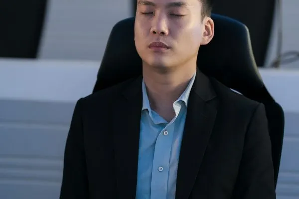 A participant resting the mind with eyes closed