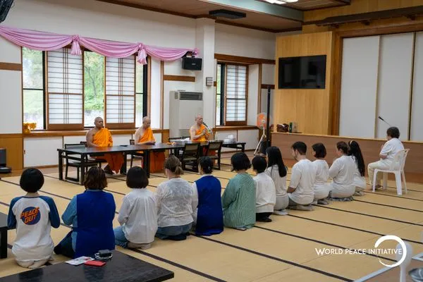Chanting together in the hall after the meal offering