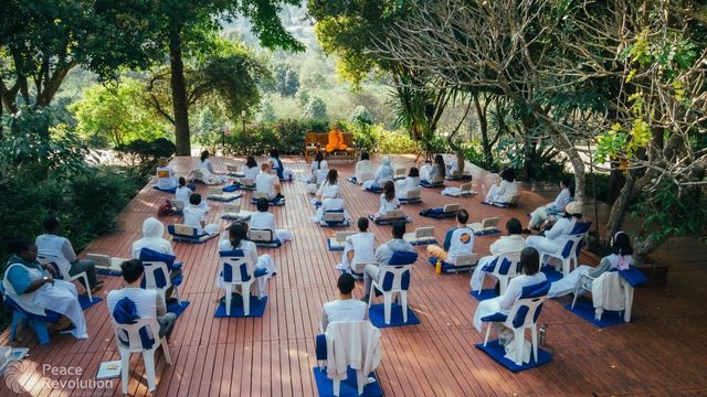 Mindfulness and meditation instructors having outdoor meditation